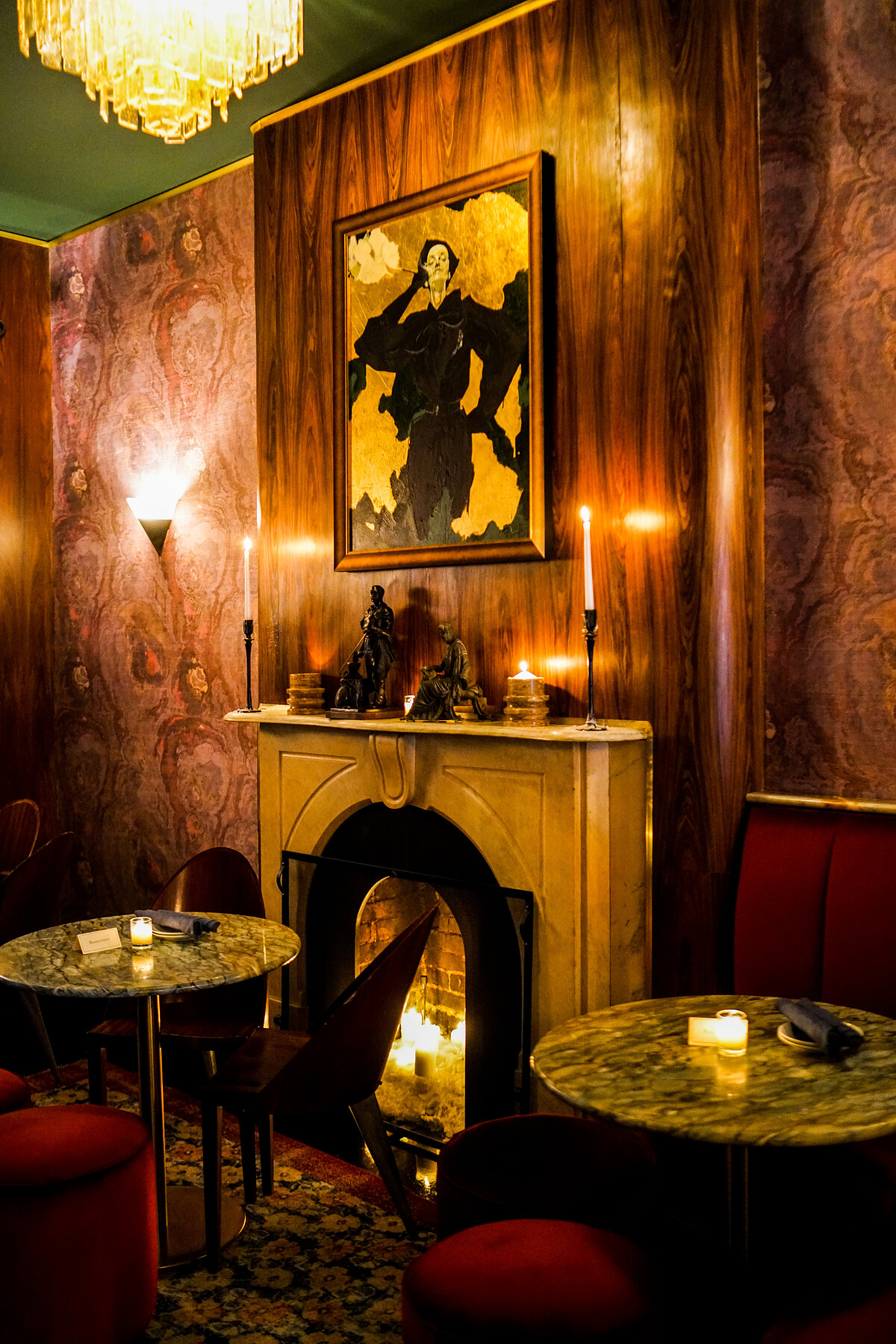 Inside Jeremy's — fireplace with portrait